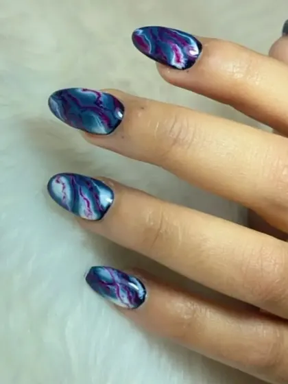A beautiful marble or "watercolor" effect using shades of blue and purple for a unique, fluid design.