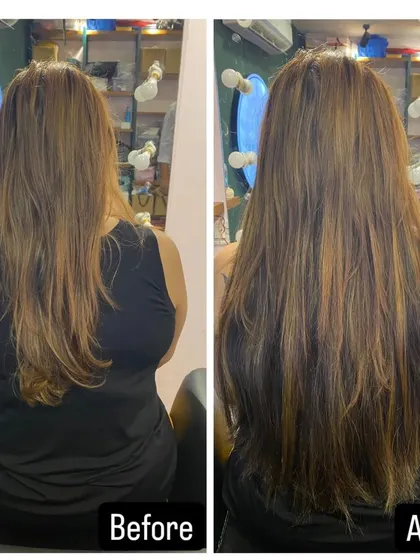 For this client, we added just enough length and volume to enhance her natural hair. The 'after' shows a thicker, more luxurious version of her own style.
