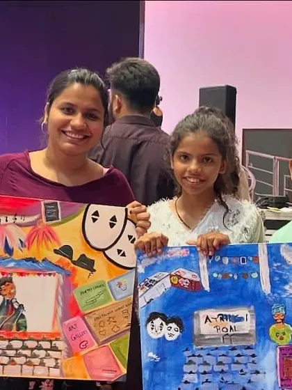 Posing with two young artists and the canvases we painted live during the 'Atrangi Bol' event. Their energy and creativity were a huge part of the process. It was a joy to collaborate with them and see their interpretation of the event come to life.
