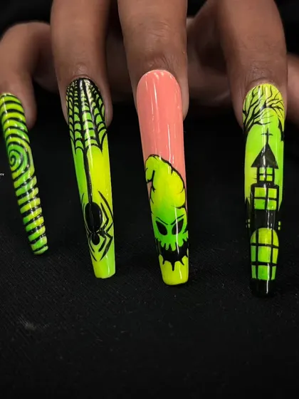 The other side of the hand, showcasing the spiderweb and spiral designs from the neon Halloween set.
