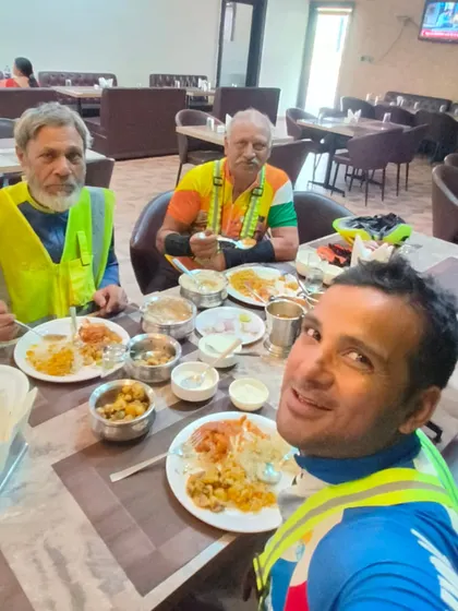 The three senior riders enjoying a hearty meal together. Good food and good company are the best rewards.