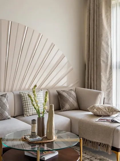 Happiness is a well-styled couch. Here, I've used a mix of pillows in varying textures, patterns, and colors to add personality and warmth, turning a simple sofa into an inviting focal point.