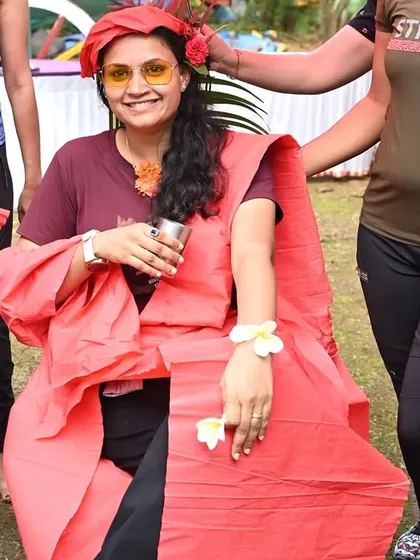 The creative result of a 'fashion show' team-building game, where teams have to dress up a model using limited supplies. This activity sparks creativity, resourcefulness, and a lot of laughter.