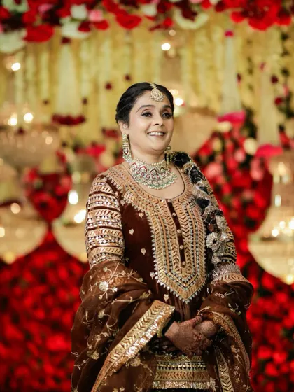 A candid, happy moment. The makeup is radiant and joyful, ensuring she looks and feels her best throughout the celebration.
