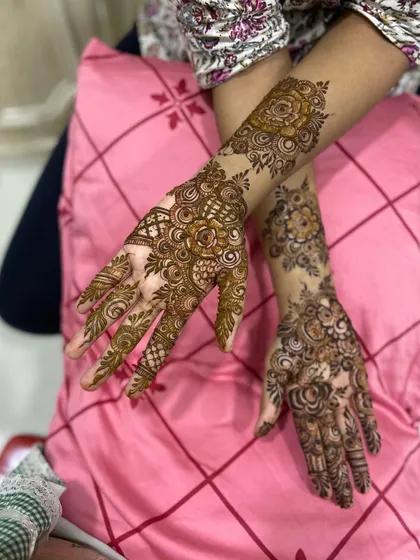 A side view showcasing the flow of the floral patterns on both hands.