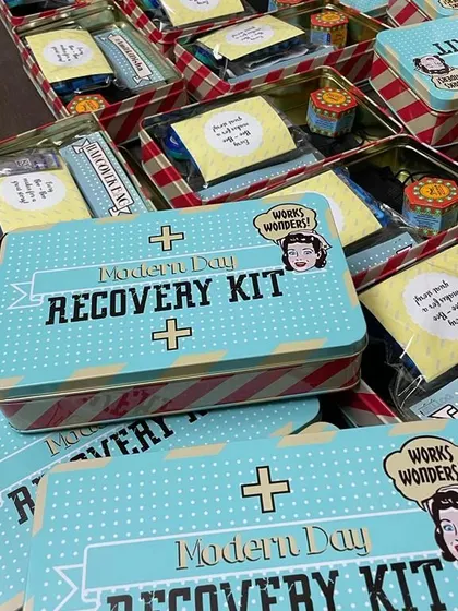 For a fun and practical favor after a long night of celebrating, I offer these "Modern Day Recovery Kits". They are packed in a retro-style tin and can be filled with items to help guests feel refreshed the next day.
