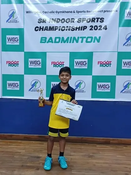 Liam Pais with his bronze medal from the U12 Boys Singles, a hard-earned achievement in a competitive field.