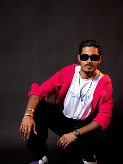 It was super fun styling YouTuber Amit Sharma, "The Indian Unboxer." We created a range of cool, casual looks, including this one with a vibrant patchwork jacket, reflecting his energetic personality.