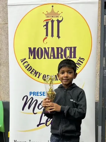 Our youngest competitor, 7-year-old Arjun, with his trophy for finishing as the U11 Runners Up at the Monarch League.
