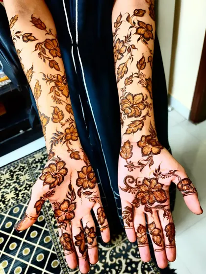 This full-sleeve design features a beautiful pattern of hibiscus flowers and leaves, creating a stunning botanical look.