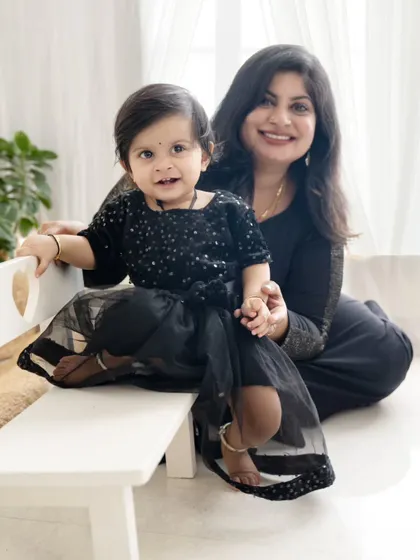 A beautiful portrait of a mother and daughter, capturing a moment of connection and love.