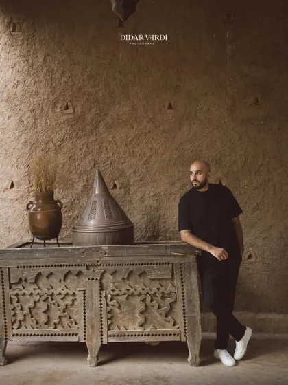 Leaning against a beautifully carved wooden chest in Marrakech. The culture and artistry of the locations we visit always inspire me.