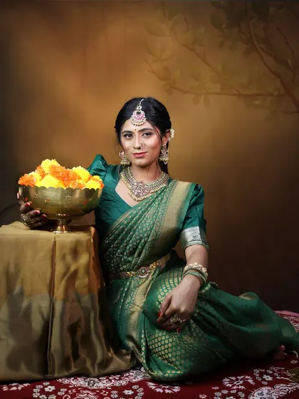 This image captures the royal feel of my Kundan and polki-style jewellery. The combination of a rich green saree with this elegant choker set is ideal for festive occasions like Diwali or for attending a wedding.