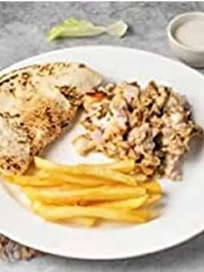 My shawarma platter gives you control over every bite. You get a portion of seasoned chicken, crispy french fries, and a piece of warm flatbread on the side.