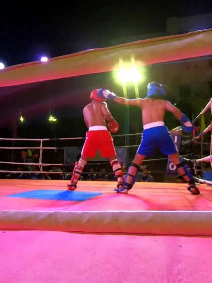 Subhan lands a clean punch on his opponent, scoring valuable points.