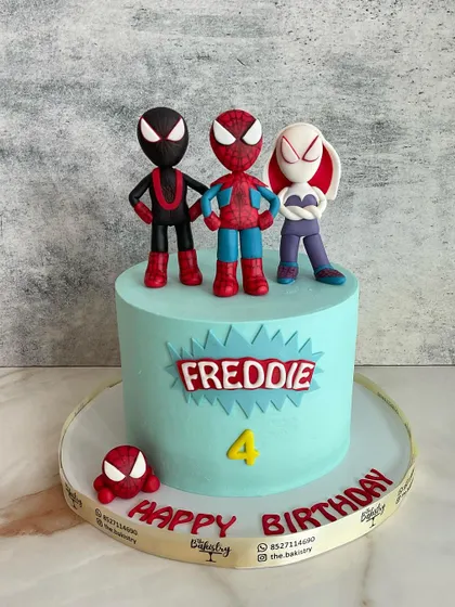 Suit up and dig in! This Spidey and His Amazing Friends cake for Freddie's 4th birthday features the heroic trio ready for action.