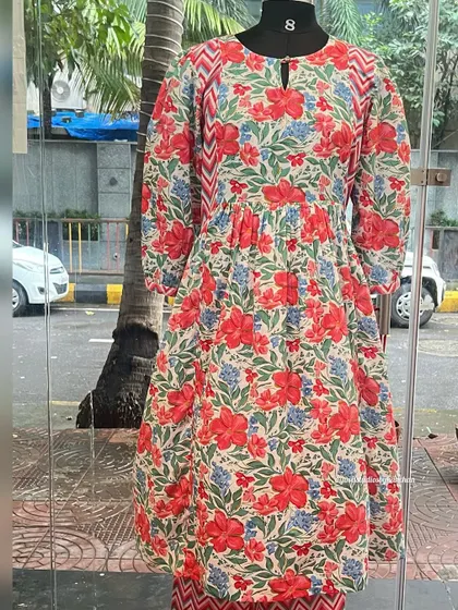 Unwrap joy this festive season with our vibrant new printed collection, shown here on a mannequin.