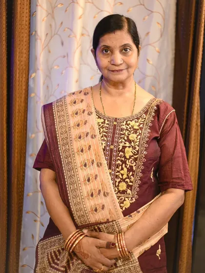 A warm, smiling portrait that captures the happy spirit of the Karwa Chauth celebration.
