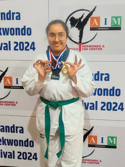 Sheezan shows off her gold medal in Kyorugi and silver medal in Poomsae from the Bandra Fest Championship. A fantastic all-around performance.