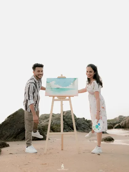 Proudly displaying their finished masterpiece. This is a fun and rewarding shot to get at the end of a themed session.