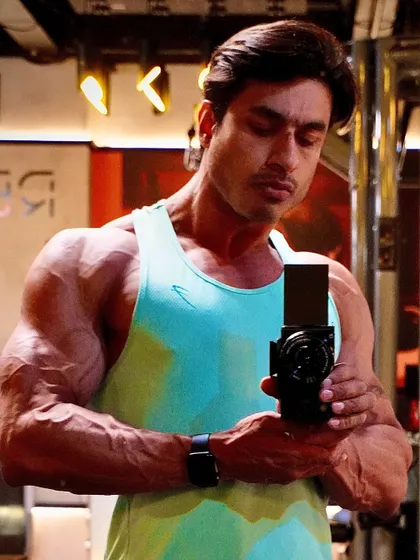 Set your heart ablaze. A shredded selfie inspired by anime, representing passion and intensity in training.
