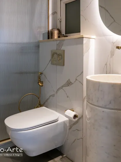 A collection of my bathroom designs, from a modern space with bold emerald fish-scale tiles to a luxurious retreat with white marble and gold fixtures. Each design is crafted to be a personal sanctuary.