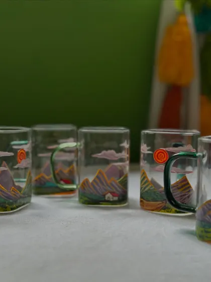 Another angle of the 'Pahari' chai mugs, showcasing the different colored handles that add a pop of fun to the design.