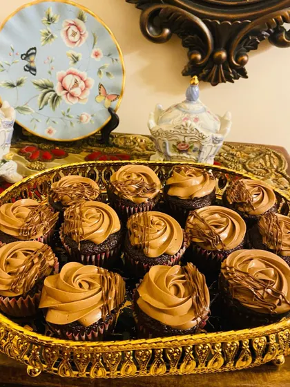 A tray of my ultra moist Nutella cupcakes, decorated with a rich Nutella frosting and a drizzle of chocolate. A true delight for Nutella fans.
