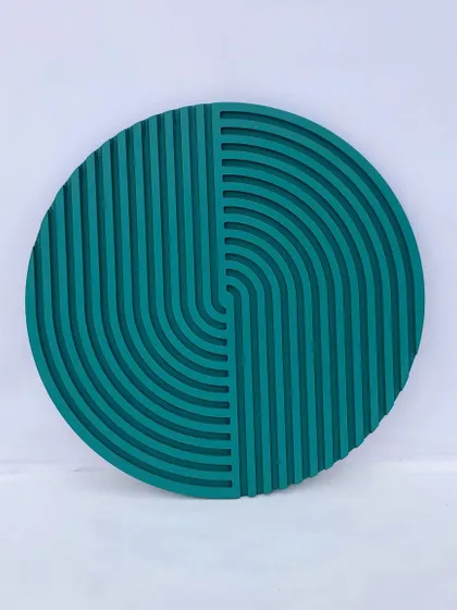 A full, centered view of the teal circular abstract art, highlighting its symmetrical and geometric pattern.