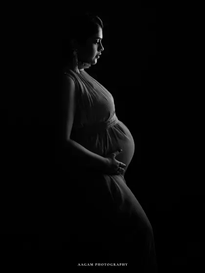 A simple, powerful silhouette that captures the universal shape and emotion of pregnancy.