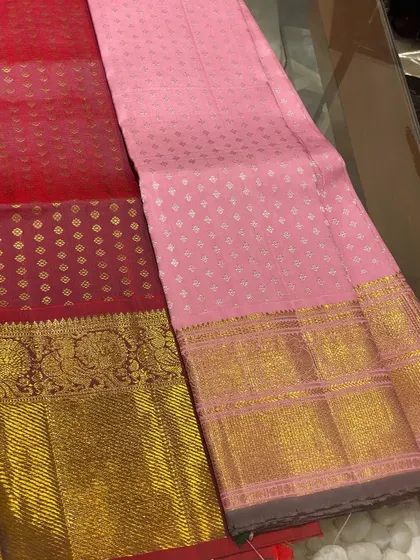 A rare combination of red and pink Kanjeevaram blouse pieces. The intricate zari work and rich colors make them a valuable addition to your festive wardrobe.