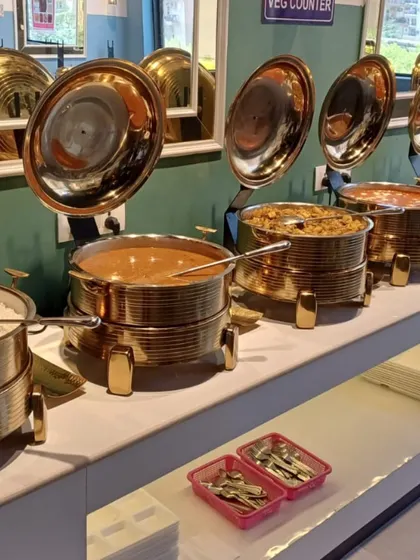 Our buffet counter is always kept clean and organized. Here you can see the steam rice, dal, and other curries ready to be served.