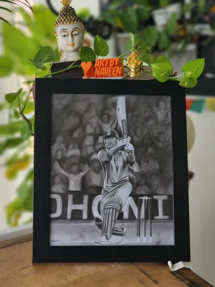 The final framed portrait of cricketer MS Dhoni, a special commission that required careful attention to the action shot and the crowd in the background.