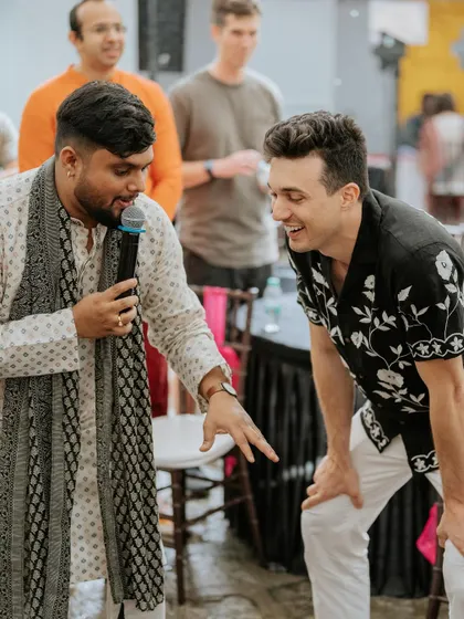 Our emcee interacting with guests and getting them involved in the fun. An interactive host makes the celebration feel more personal and lively for everyone.