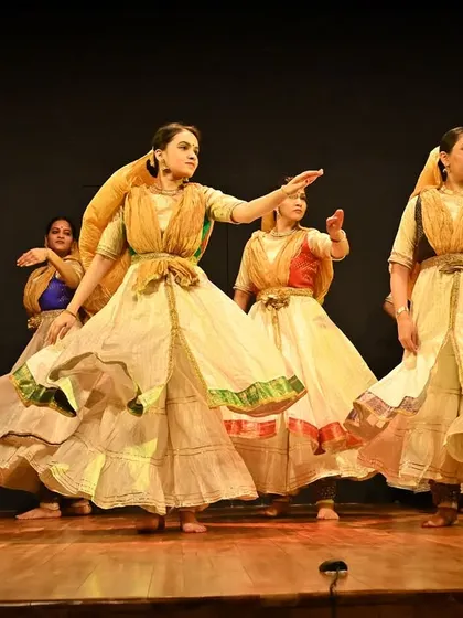 My ensemble in a graceful, synchronized pose. This image highlights the elegance and coordination of a traditional group Kathak performance.
