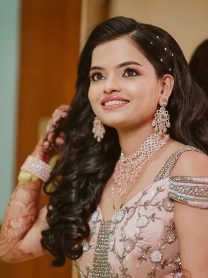 A candid shot of my bride Neelam. Her makeup is fresh and radiant, designed to look beautiful in natural light.