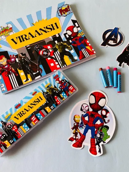 Get your little champs excited for school with this personalised Avengers stationery set. It includes a custom notebook, pencil box, crayons, and fun character cutouts.