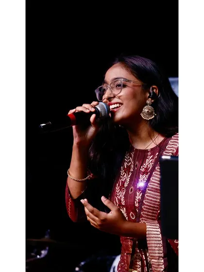 A close-up shot from a wedding performance in Gangavathi. I love wearing traditional outfits that complement the festive atmosphere of Indian weddings.