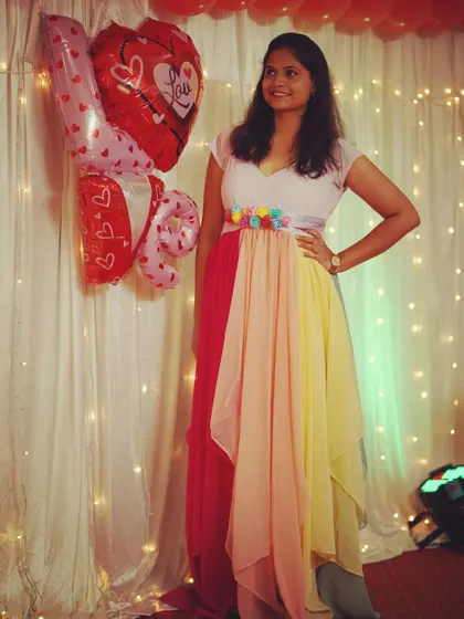 The rainbow gown is a limited edition piece, perfect for creating a joyful and colorful look for parties, events, or pre-wedding shoots.