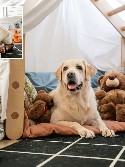 Shelby relaxing in her fort, surrounded by teddy bears. This shot from her 10th birthday session is full of charm and personality.