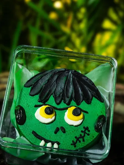A close-up of the Frankenstein's monster mini bento cake.