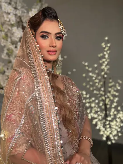 Bridal beauty at its finest. This client wanted a soft, romantic look for her event, and we delivered with glowing makeup and elegant styling.