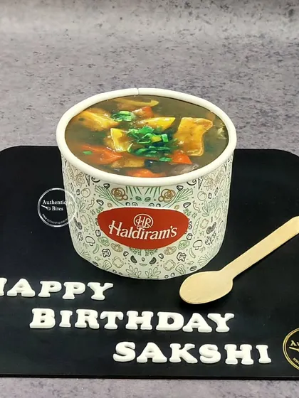 Is it a cake or a box of Haldiram's chilly paneer? This hyper-realistic cake is a fun surprise for anyone who loves savory food.