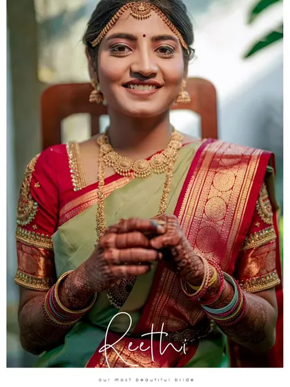 A joyful and radiant portrait of the bride, her happiness shining through in her beautiful smile.