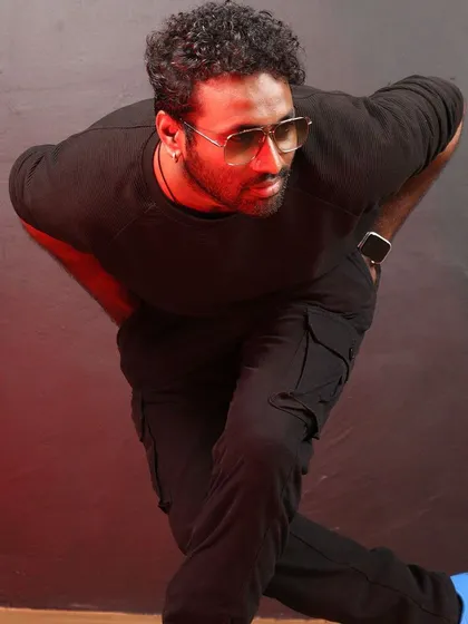 A statement pose from our choreographer. This photo captures the cool, confident style and artistic vision we bring to our work.