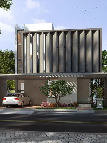 The Nayak Residence showcases our application of green building principles in a contemporary design. The large concrete fins are not just a strong visual element; they provide passive cooling by shading the interiors, reducing energy consumption while ensuring privacy.