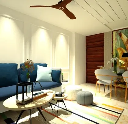 The same living room design, showing the effect of focused spotlights on the wall. Lighting plays a crucial role in setting the mood and highlighting design features.