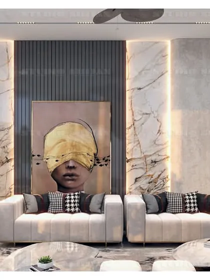 A drawing room in Kirti Nagar with a bold, artistic flair. The space features a large, contemporary painting, a classical bust, and dramatic marble wall panels.