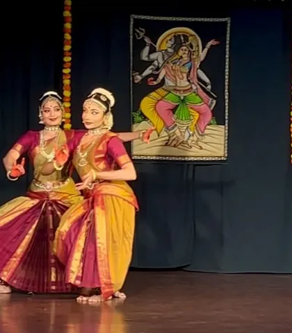 A moment of perfect synchronicity during a duet performance for World Dance Day. Dancing with a partner brings a unique dynamic of contrast and connection to the stage.