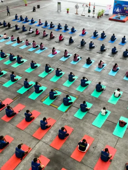 An aerial view of a massive yoga session for naval officers. The scale of these events highlights the widespread adoption of yoga within our country's defense forces for holistic fitness.